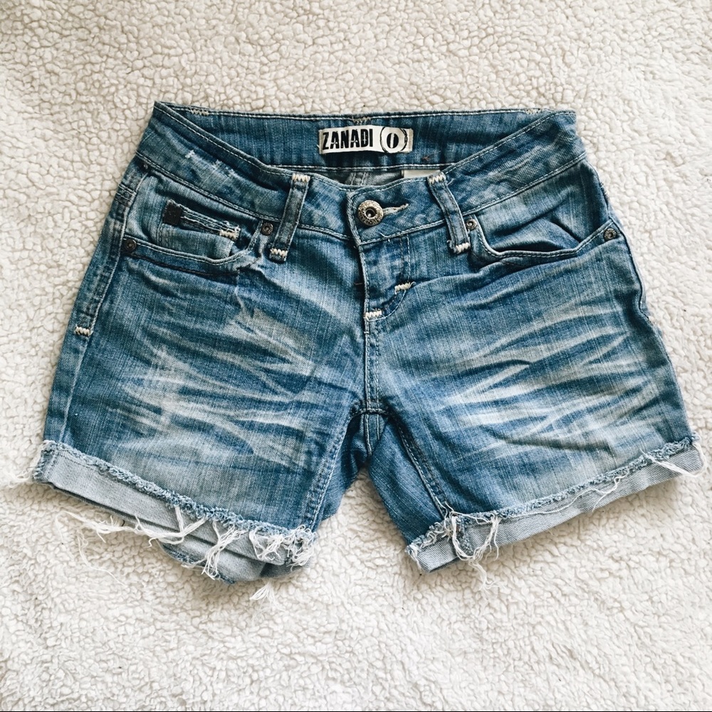 DISTRESSED DENIM SHORTS
